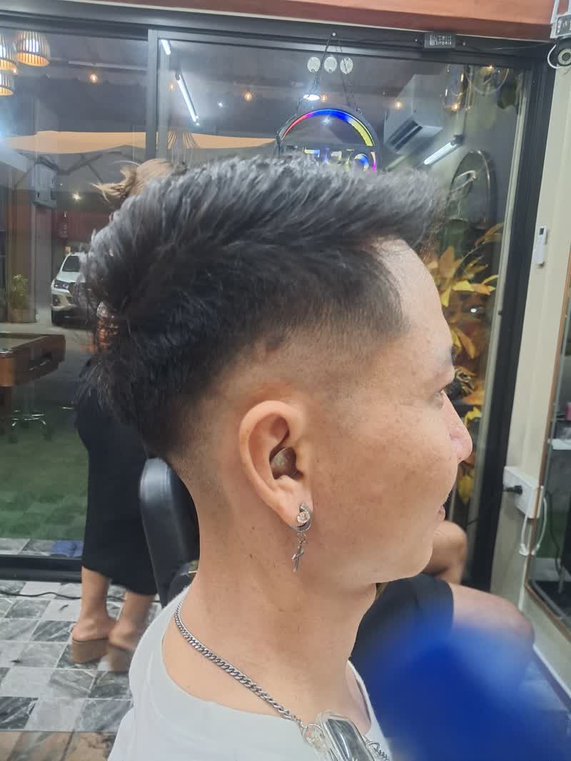 Fresh fade styled into spikes on top